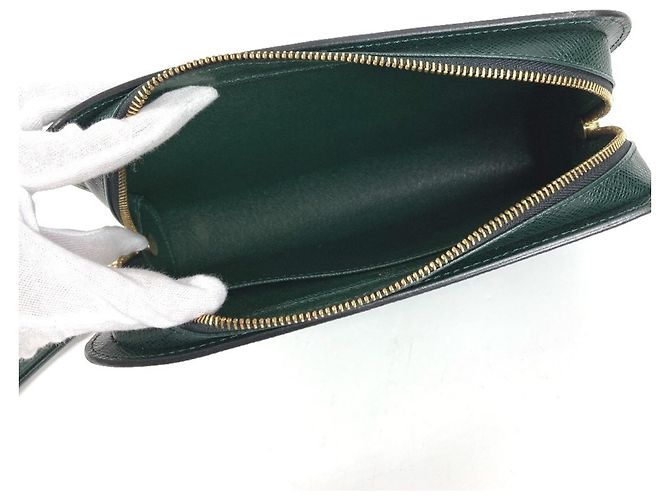 Pochette a mano Louis Vuitton Taiga Baikal Cachi - vista 5