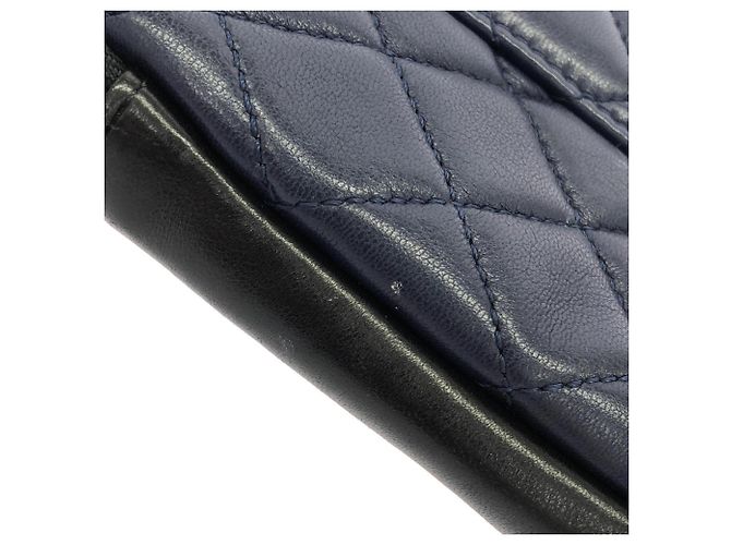 Borsa a tracolla Chanel Girl Line 91386 Nero Blu navy - vista 5