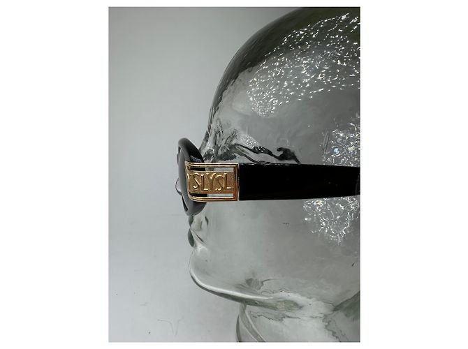 Lunettes de soleil vintage Yves Saint Laurent noires et dorées avec logo YSL - vue 3