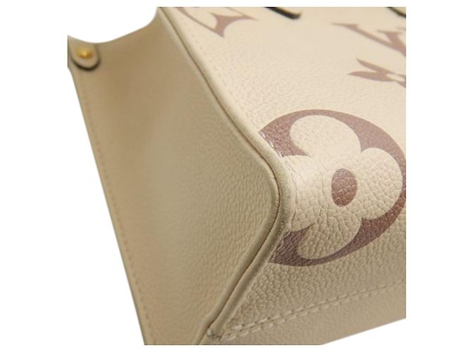 Louis Vuitton Beige Bicolor Monogram Empreinte Giant Onthego PM - vista 14