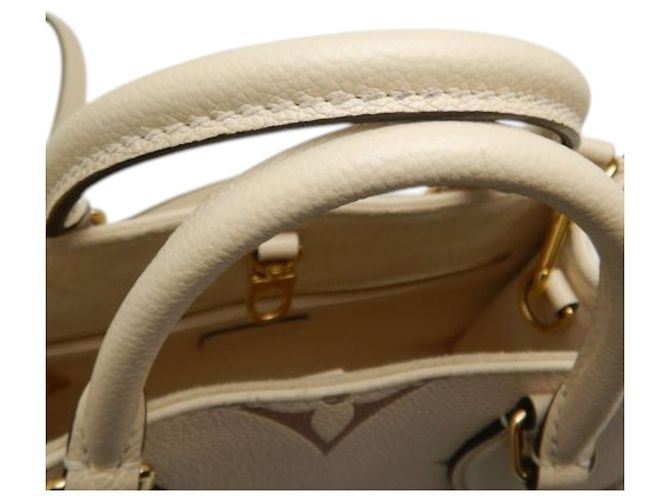 Louis Vuitton Beige Bicolor Monogram Empreinte Giant Onthego PM - vista 21