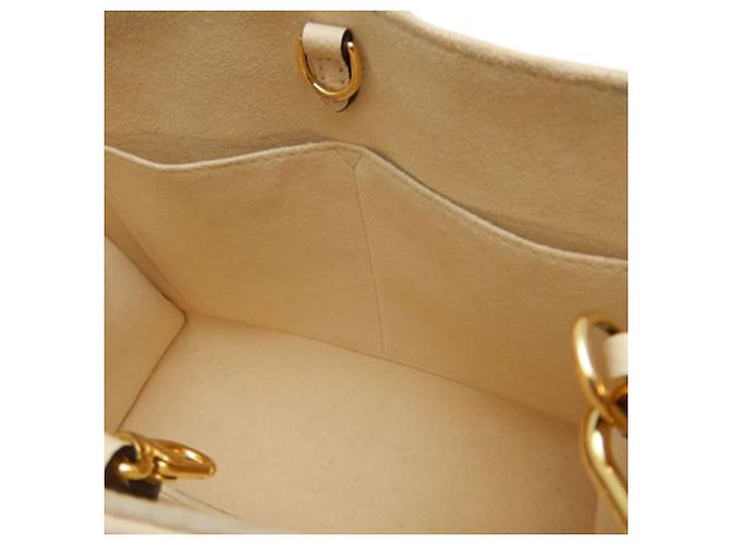 Louis Vuitton Beige Bicolor Monogram Empreinte Giant Onthego PM - vista 6