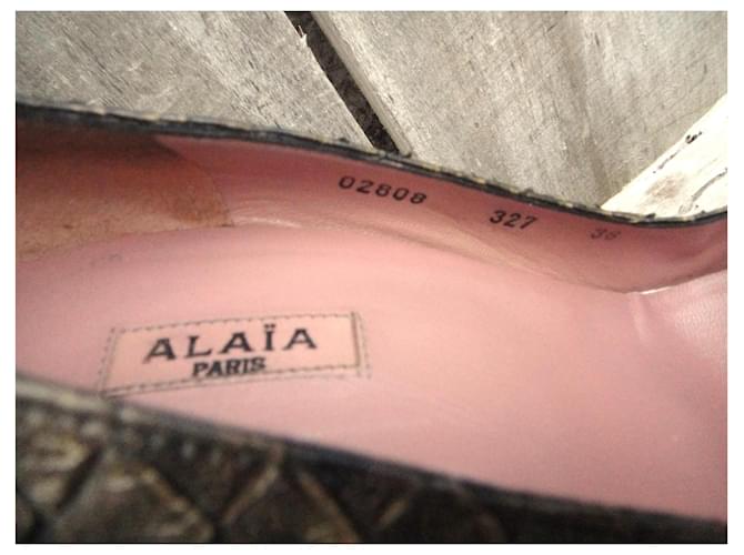 Alaïa Pumps aus goldenem Pythonleder - Ansicht 6
