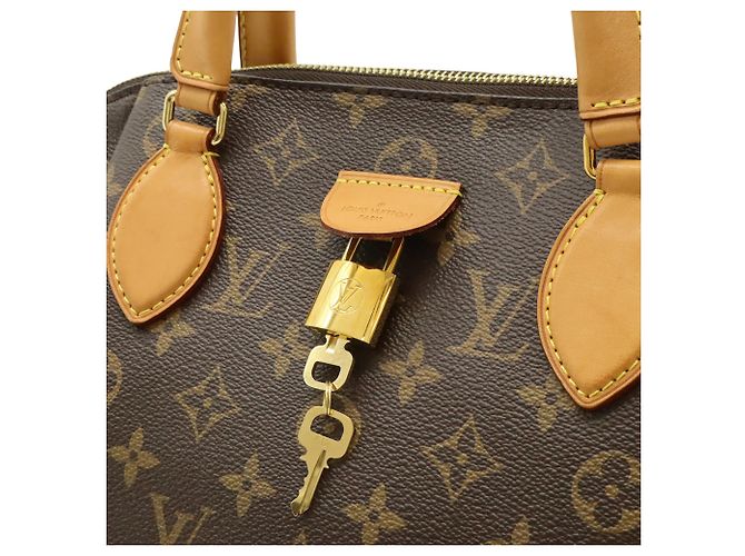 Bolso Louis Vuitton Monogram Rivoli MM Castaño - vista 10