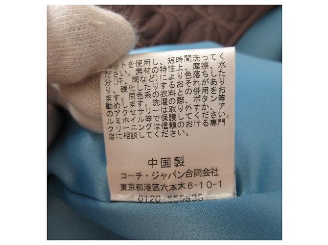 Chaqueta acolchada de nylon Coach Signature Castaño Azul - vista 10
