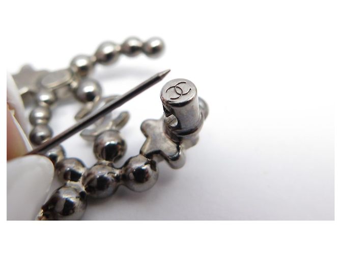 CHANEL CC LOGO STERN STRASS BROSCHE AUS SILBERFARBENEM METALL + STAR BOX - Ansicht 5