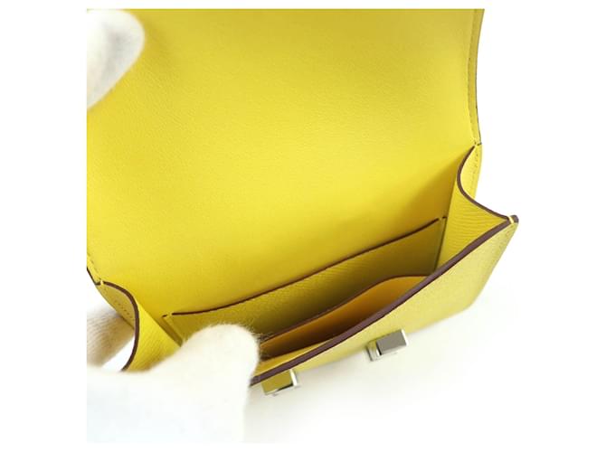Cartera Hermès Constance Slim Epsom Amarillo - vista 8