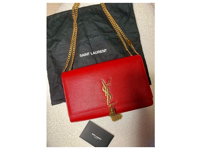 Yves Saint Laurent Bolsa Saint Laurent Kate em couro vermelho com pompom - vista 13