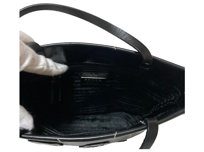 Borsa a mano in pelle con logo triangolo Prada e motivo floreale Nero - vista 8