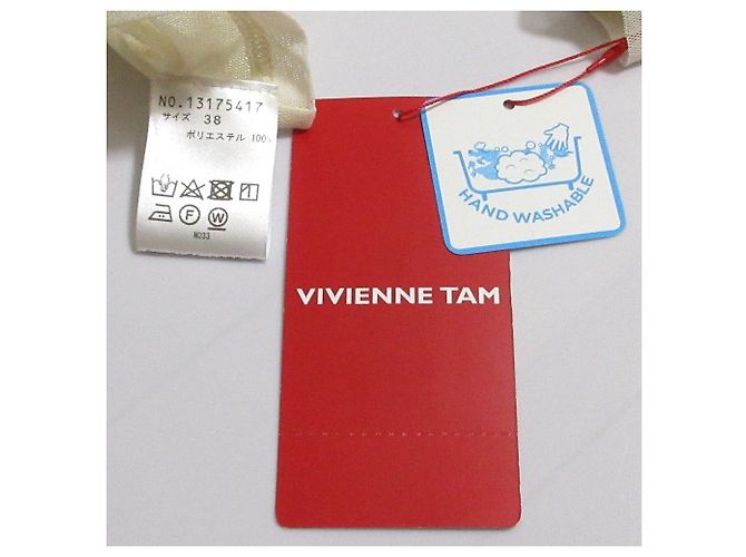 Autre Marque VIVIENNE TAM Top corto a maniche lunghe Crudo - vista 9