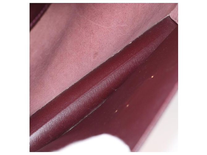 Louis Vuitton Serviette Kourad Taiga Leather Bordò - vista 5
