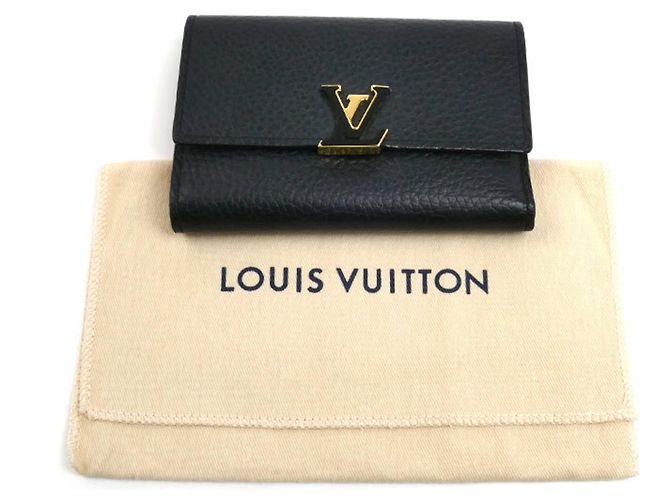Portafoglio Louis Vuitton Portefeuille Capucines Compact Tri-fold Wallet D'oro - vista 9