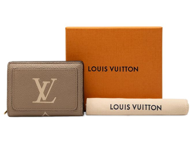 Portafoglio Louis Vuitton Clea Monogram Empreinte Bicolore Beige - vista 8