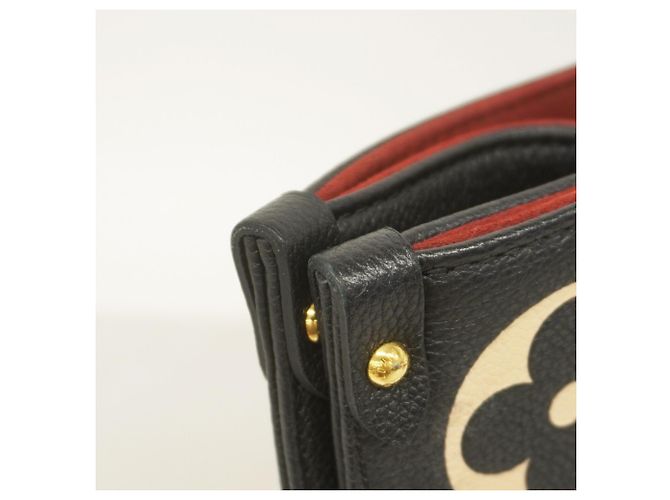 Borsa Tote Louis Vuitton Monogram Empreinte Bicolor OnTheGo MM Nero Beige - vista 8