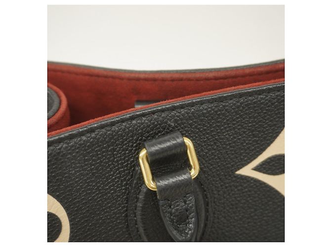 Borsa Tote Louis Vuitton Monogram Empreinte Bicolor OnTheGo MM Nero Beige - vista 9