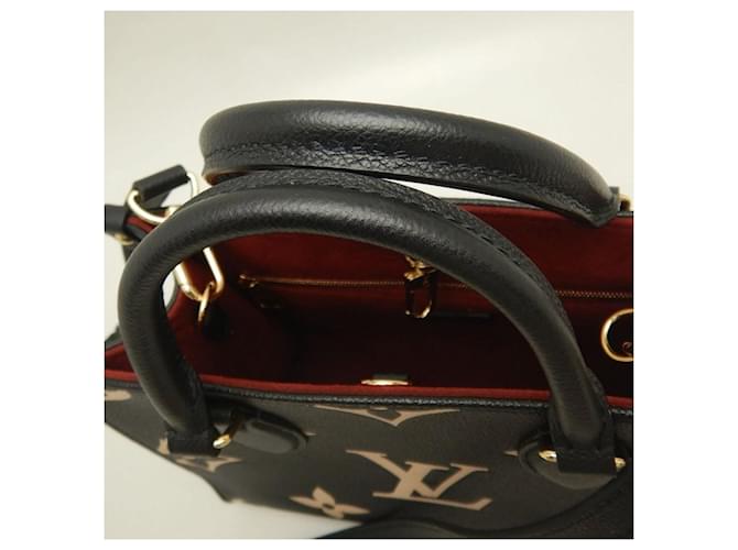 Bolso Louis Vuitton Bicolor Monogram OnTheGo PM Negro Beige - vista 9