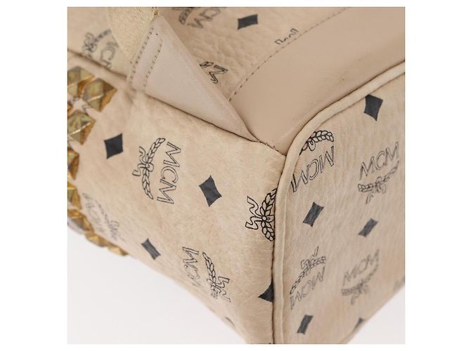 Mochila MCM Vicetos Logogram PVC Leather Ivory Gold Auth 179462 Dourado Cru - vista 14