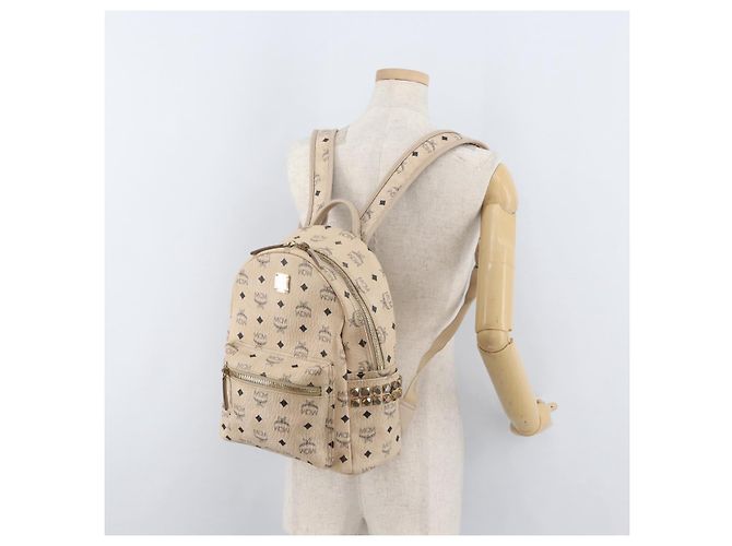 Mochila MCM Vicetos Logogram PVC Leather Ivory Gold Auth 179462 Dourado Cru - vista 24