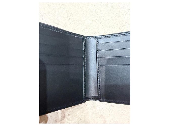 Gucci GG Embossed Black Leather Bifold Wallet - view 5
