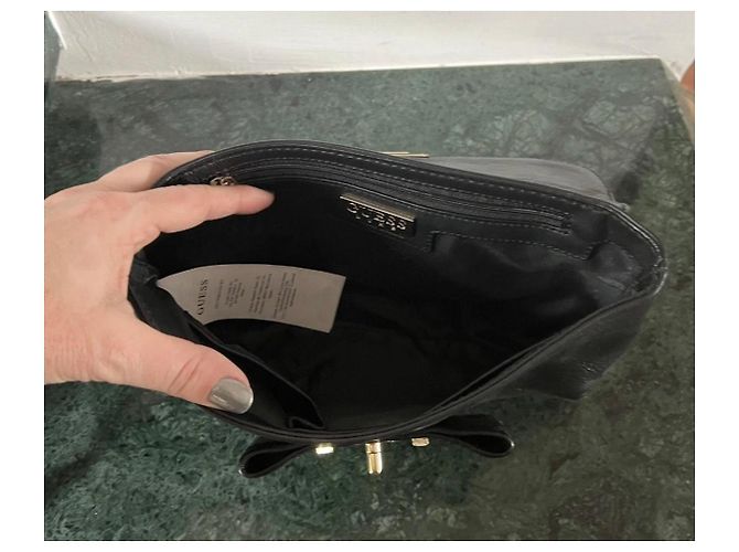 Clutch in pelle Guess Luxe con borchie e fiocco - Nero - vista 5