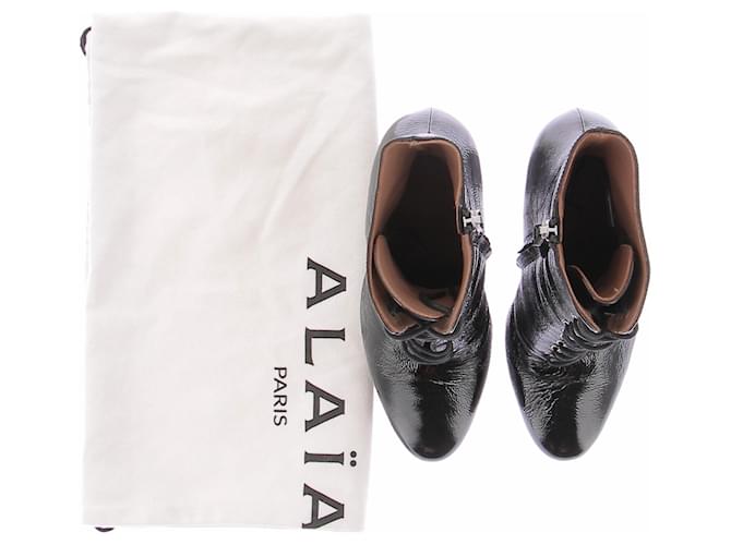 Alaïa Botas de charol negro - vista 8