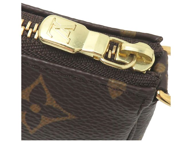 Pochette Louis Vuitton Mini Pochette Accessoires Castaño - vista 10
