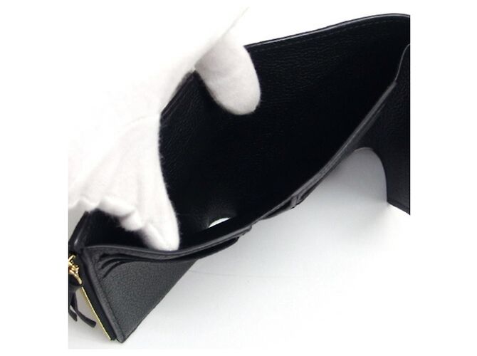 Louis Vuitton Monogram Empreinte Carteira Victorine Preto - vista 8