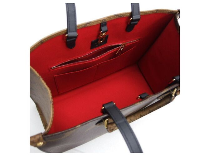 Louis Vuitton Monogram Giant Reverse OnTheGo MM Marrone Marrone scuro - vista 5