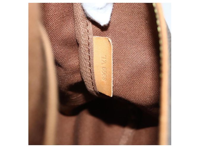 Louis Vuitton Saumur Monogram Canvas 35 Marrone - vista 7