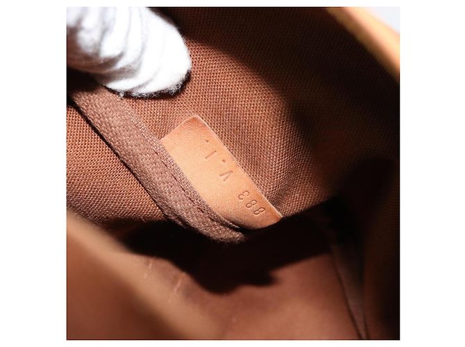 Louis Vuitton Saumur Monogram Canvas 35 Marrone - vista 7