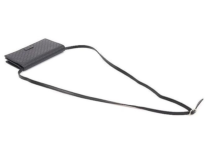 Clutch a tracolla in pelle micro Guccissima con logo GG nero - vista 4