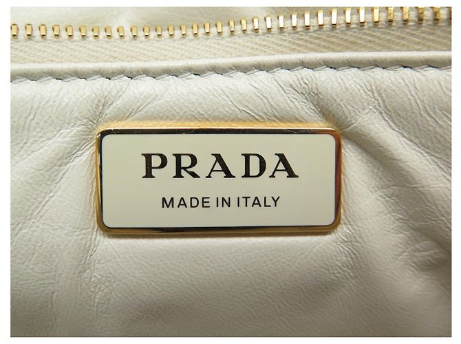 BOLSA DE MÃO PRADA SPECTRUM EM COURO NAPPA COM ALÇA DE CORRENTE DOURADA Cru - vista 10
