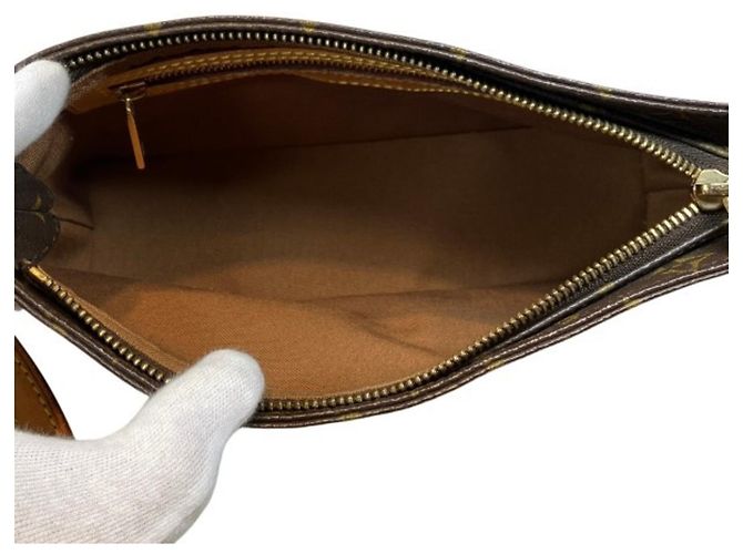 Bolsa Louis Vuitton Monogram Trotteur Marrom - vista 7