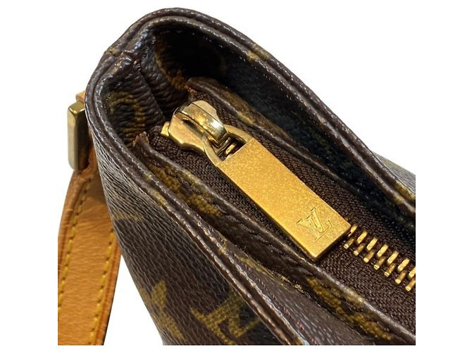Bolsa Louis Vuitton Monogram Trotteur Marrom - vista 8