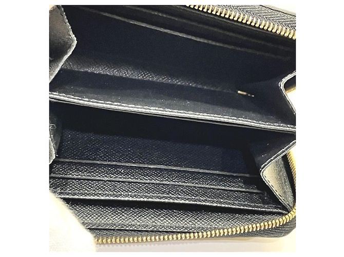 Porta-moedas Louis Vuitton Monogram Blossom Zippy Marrom Preto - vista 3