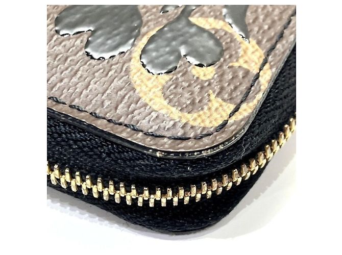 Porta-moedas Louis Vuitton Monogram Blossom Zippy Marrom Preto - vista 6