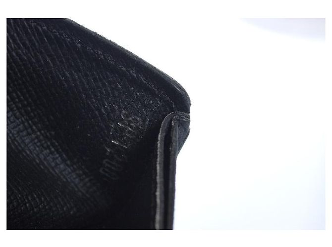 Louis Vuitton, black grained leather wallet with LV - view 4