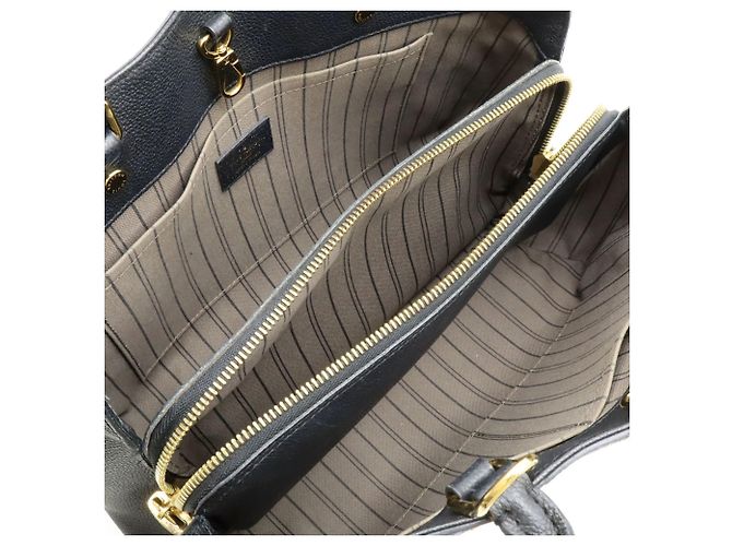 Borsa Louis Vuitton Monogram Empreinte Montaigne MM Nero - vista 7