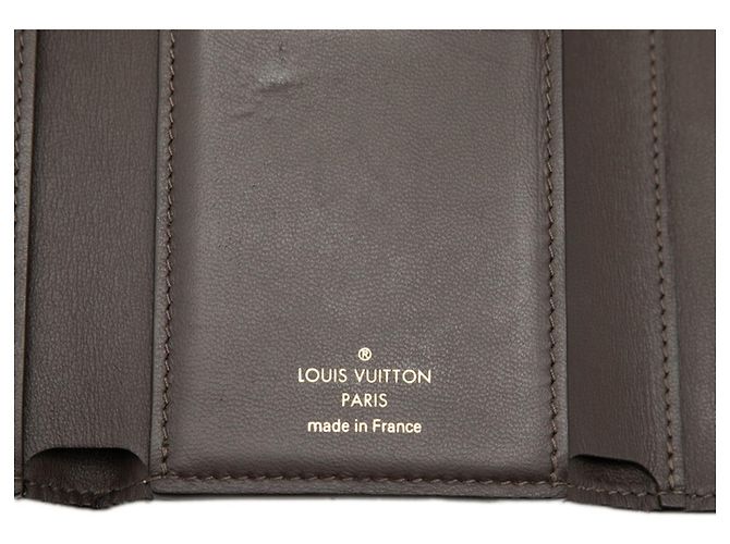 Cartera Louis Vuitton Capucines Compact Beige - vista 7