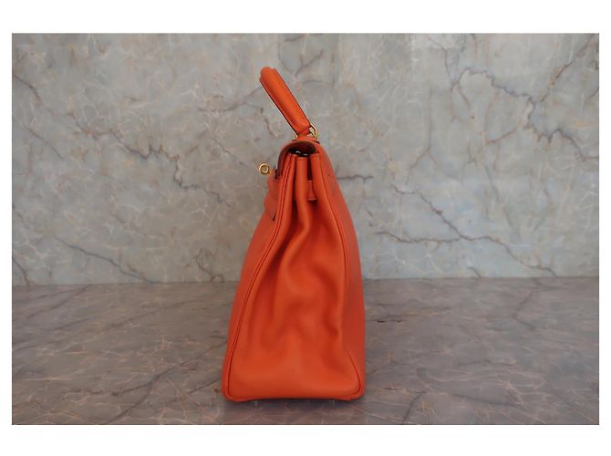 Hermès Sac à main Hermes Kelly Orange Gulliver avec fermoir doré 32 - vue 4