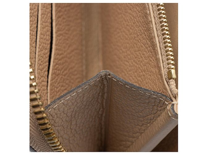Portafoglio Zippy Monogram Empreinte Louis Vuitton Marrone Beige - vista 9