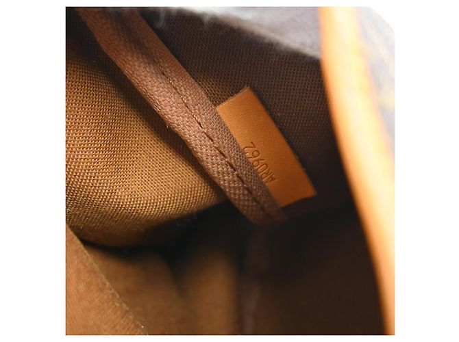 Louis Vuitton Saumur Monogram Canvas 35 Marrone - vista 4