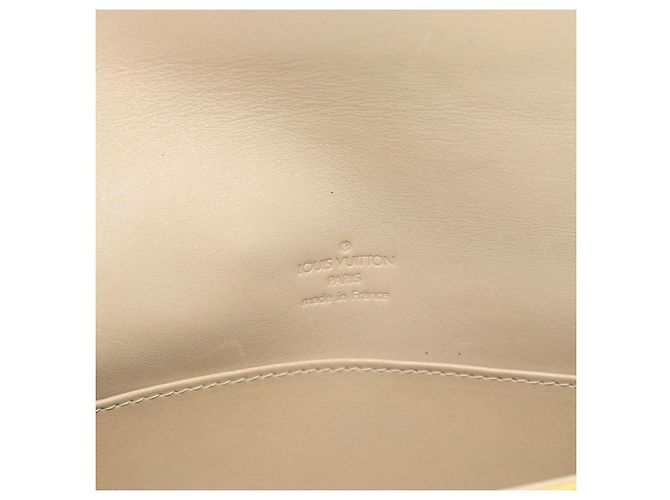 Louis Vuitton Thompson Street Monogram Vernis Medium Amarillo - vista 6