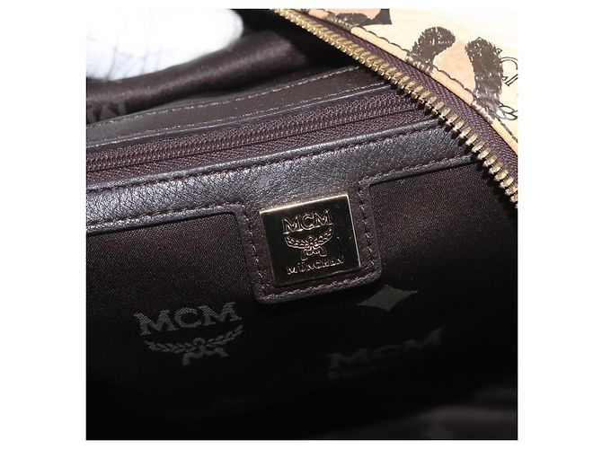 Zaino MCM Vicetos Logogram PVC Leather Ivory Gold Auth 176436 D'oro Crudo - vista 19