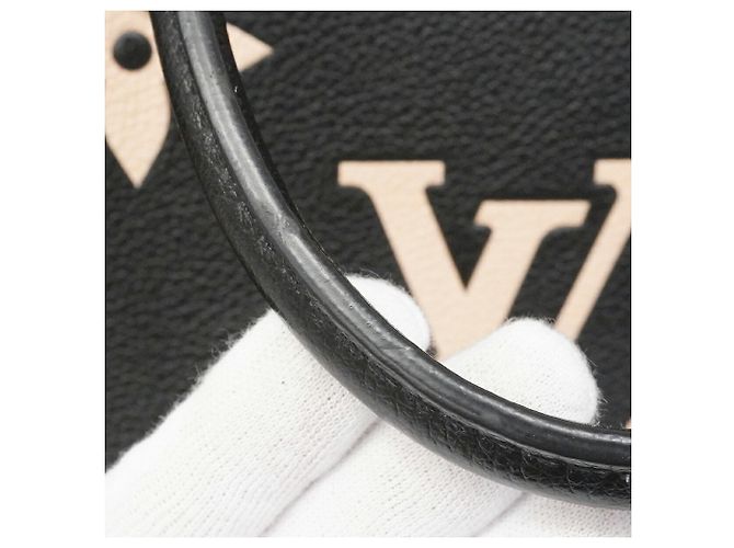 Borsa Tote Louis Vuitton Monogram Empreinte Bicolor OnTheGo MM Nero Beige - vista 7