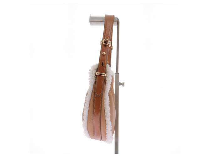 Prada Bolsa Arqué Small em couro e shearling Marrom - vista 5