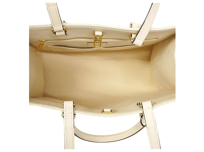 Borsa Tote Louis Vuitton Monogram Empreinte OnTheGo MM Crudo - vista 4