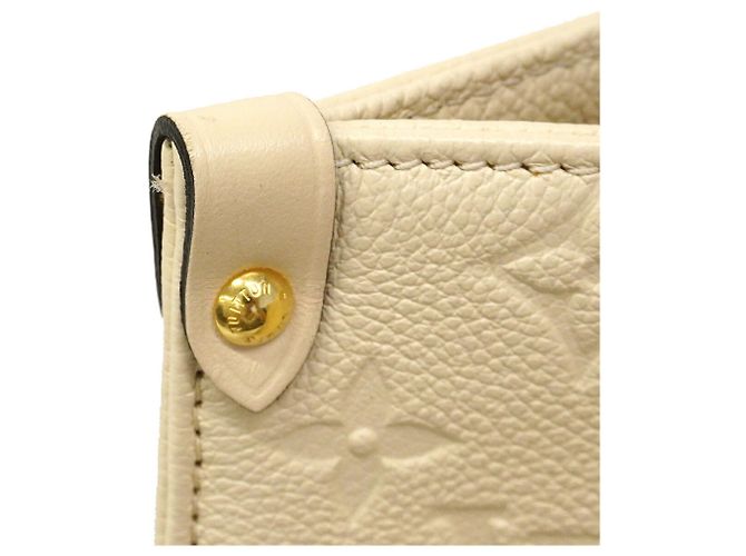 Borsa Tote Louis Vuitton Monogram Empreinte OnTheGo MM Crudo - vista 8