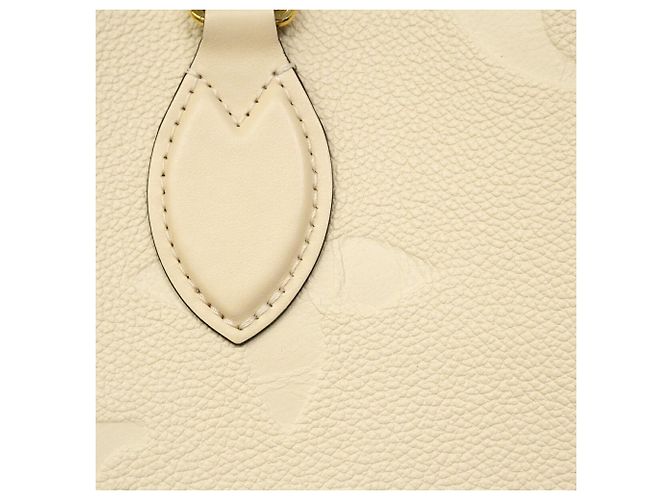 Borsa Tote Louis Vuitton Monogram Empreinte OnTheGo MM Crudo - vista 9