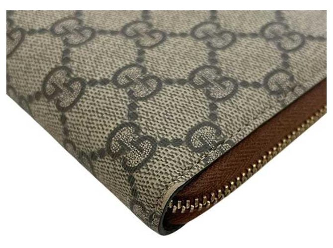 Portafoglio lungo rotondo beige e marrone Gucci - vista 9